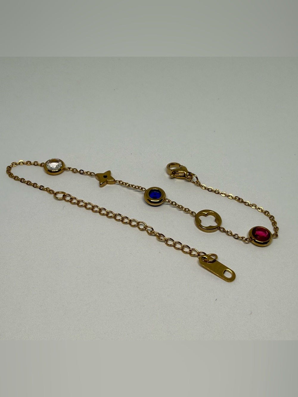 Gold Tone Charm Chain Bracelet with Colored Stones